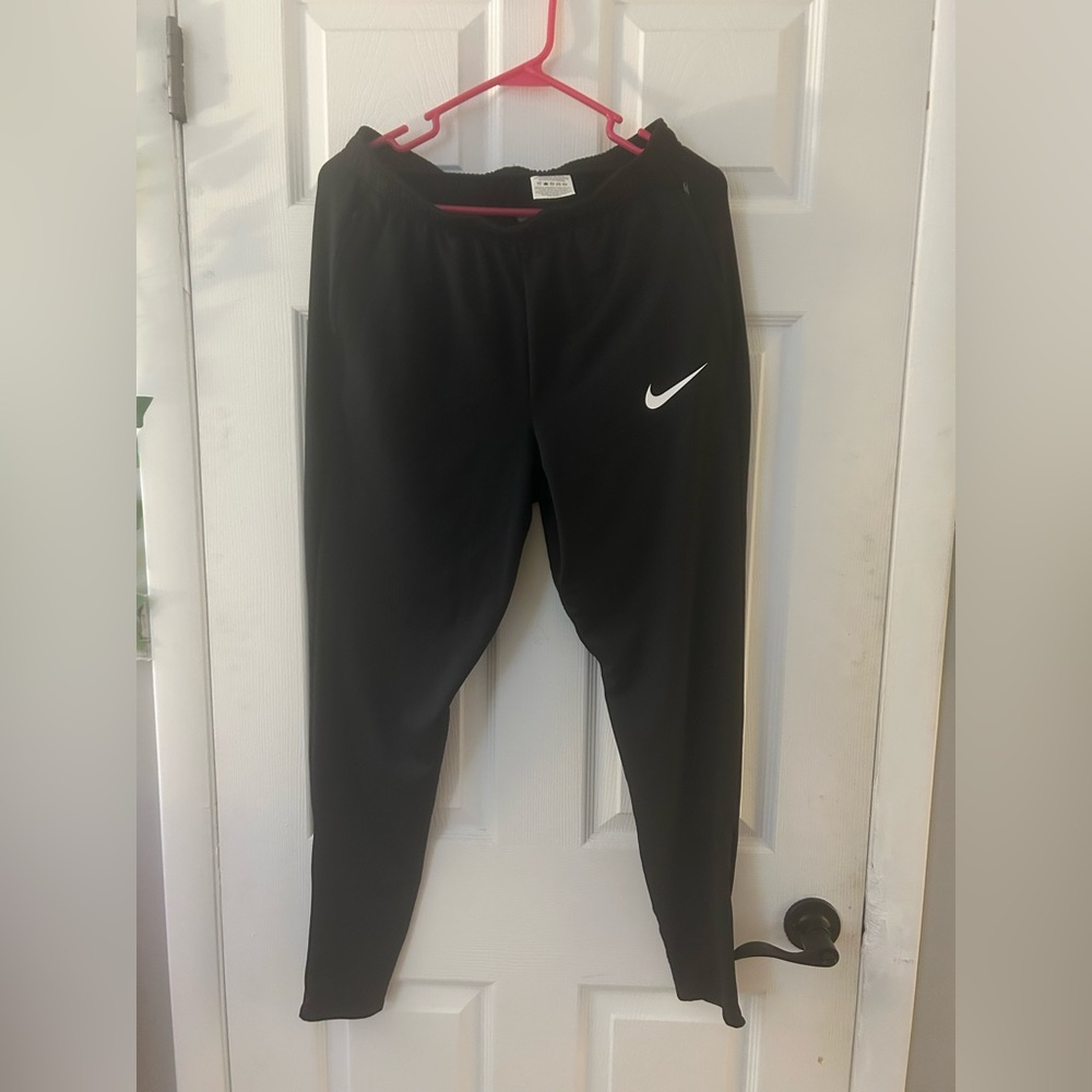 Nike Kids Black Joggers with White Swoosh
